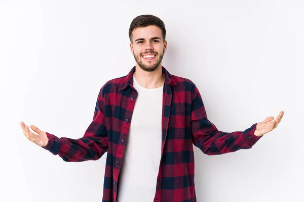 Young Caucasian Man Posing White Background Isolated Showing Welcome Expression — Stock Photo, Image