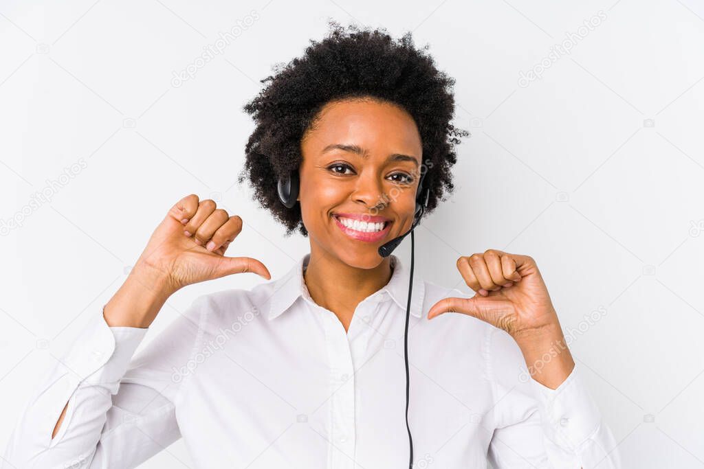 Young african american telemarketer woman isolated feels proud and self confident, example to follow.
