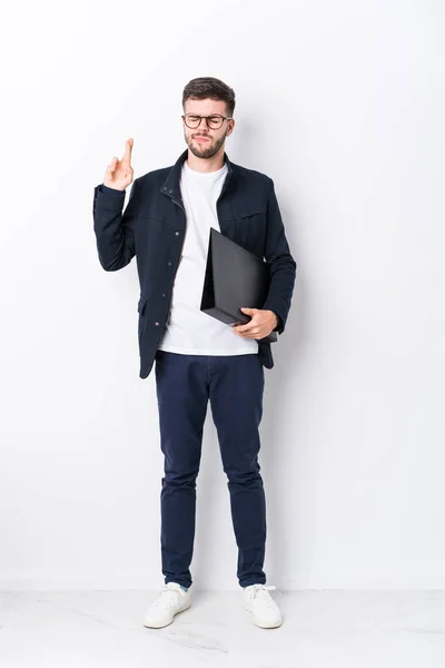Young Caucasian Man Full Body Isolated Crossing Fingers Having Luck — Stock Photo, Image
