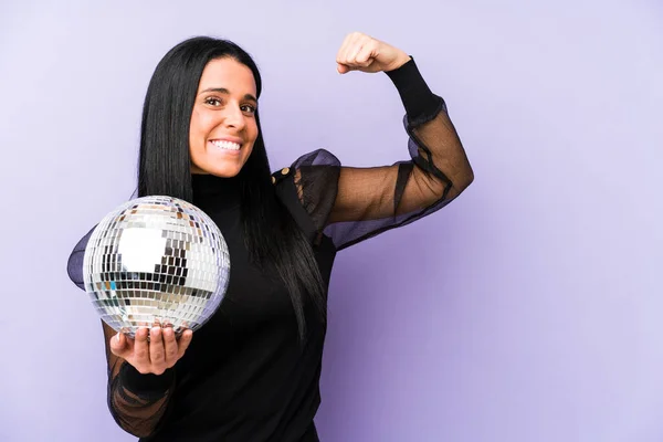 Woman Holding Ball Party Isolated Purple Background Raising Fist Victory — Stock Photo, Image