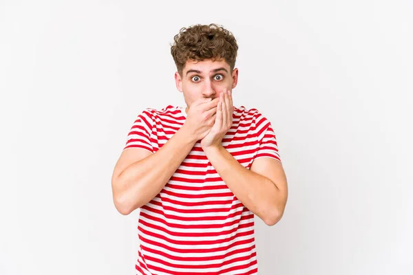 Young Blond Curly Hair Caucasian Man Isolated Covering Mouth Hands — Stock Photo, Image