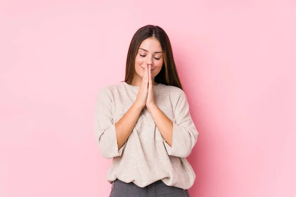 Young Caucasian Woman Posing Isolated Holding Hands Pray Mouth Feels — Stock Photo, Image