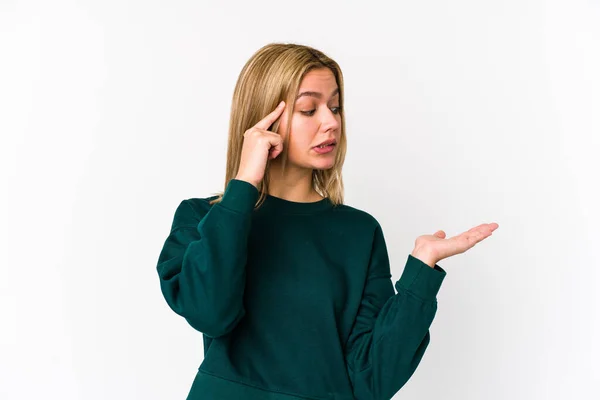 Young Blonde Caucasian Woman Isolated Holding Showing Product Hand — Stock Photo, Image