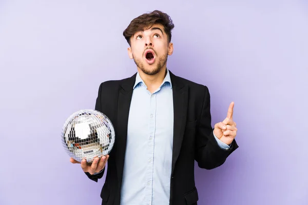 Young Arabian Man Holding Party Ball Isolated Pointing Upside Opened — Stock Photo, Image