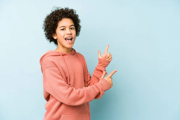 African American Little Boy Isolated Pointing Forefingers Copy Space Expressing — Stock Photo, Image
