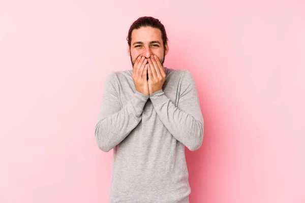 Young Long Hair Man Isolated Pink Background Laughing Something Covering — Stock Photo, Image