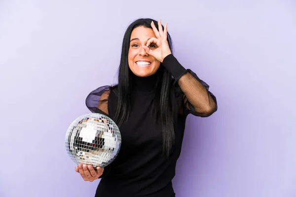 Woman Holding Ball Party Isolated Purple Background Excited Keeping Gesture — Stock Photo, Image