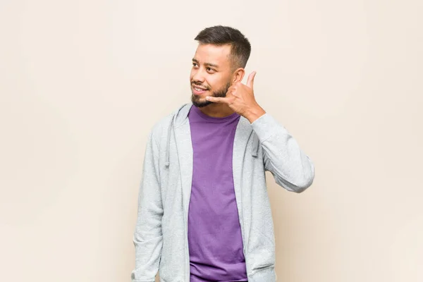 Young South Asian Man Showing Mobile Phone Call Gesture Fingers — Stock Photo, Image
