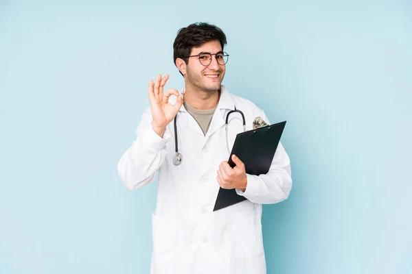 Young Doctor Man Isolated Blue Background Cheerful Confident Showing Gesture — Stock Photo, Image