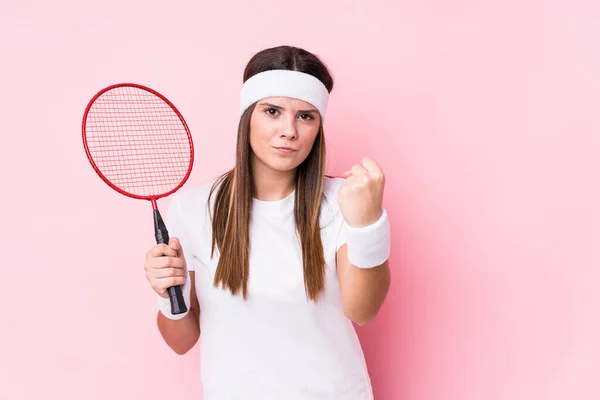Young Caucasian Woman Playing Badminton Isolated Showing Fist Camera Aggressive — Stok fotoğraf