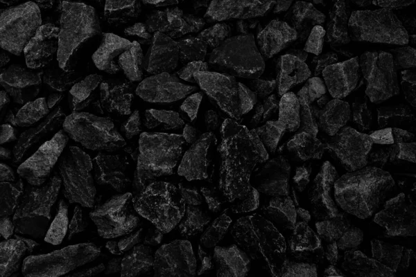 Koyu siyah kömür desenli doğal ateş külleri. Yanıcı siyah sert kayalardır. Metin için boşluk