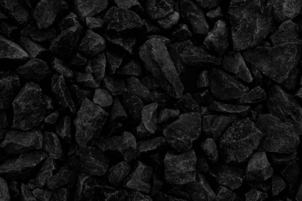 Koyu siyah kömür desenli doğal ateş külleri. Yanıcı siyah sert kayalardır. Metin için boşluk