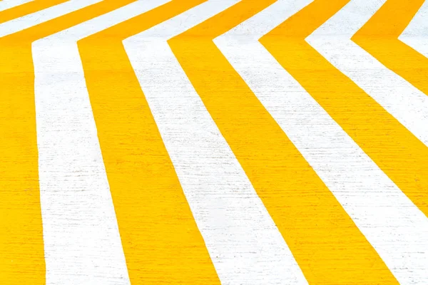 Striped yellow white road, sign