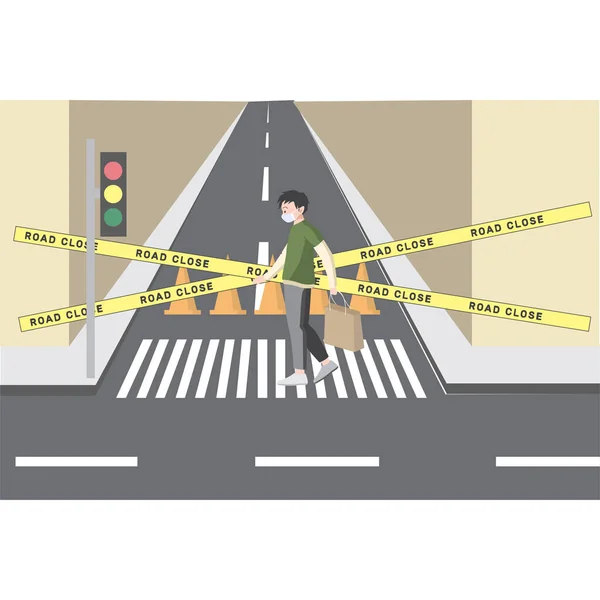 Salgın yüzünden bir adam kapalı yolda yürüyor.