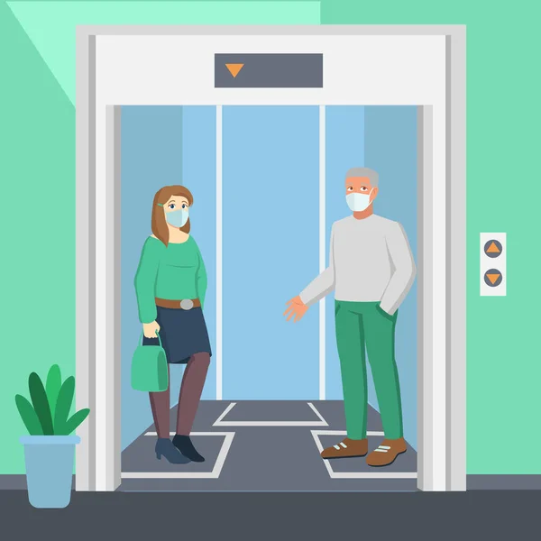 İnsanlar asansör kullanırken mesafelerini koruyorlar.