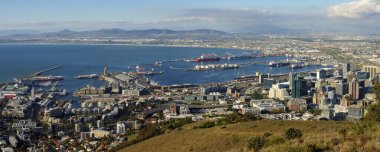 Amazing panoramic view of beautiful Cape Town from the slopes of Signal Hill showing V&A waterfront, harbour and business centre. Western Cape. South Africa clipart