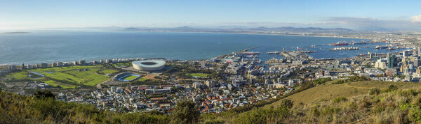 Amazing panoramic view of beautiful Cape Town from Signal Hill showing V&A waterfront, harbour sea point, soccer stadium, Green Point and Robben Island out to sea. Western Cape. South Africa