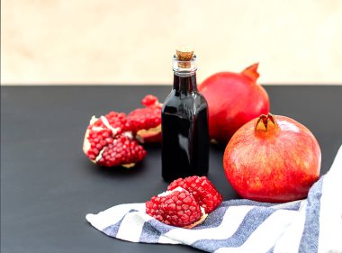 Pomegranate molasses or Narsharab sauce. Selective focus clipart