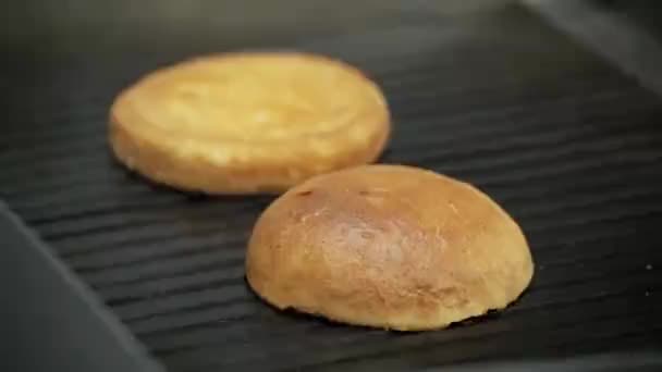 Toasting Burger Buns Hot Stove — Stock Video
