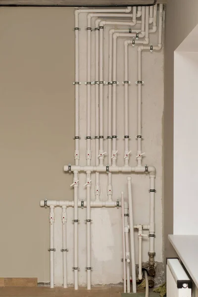 clean line white water pipes watering system pipe engineer design in underground. plastic white pipe heating manifold.