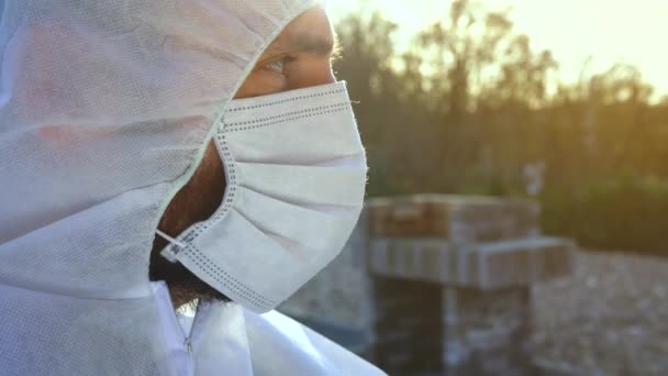 Doctor Wearing Antiviral Protective Surgical Face Mask Coveralls Coronavirus Pandemic — Stock Video