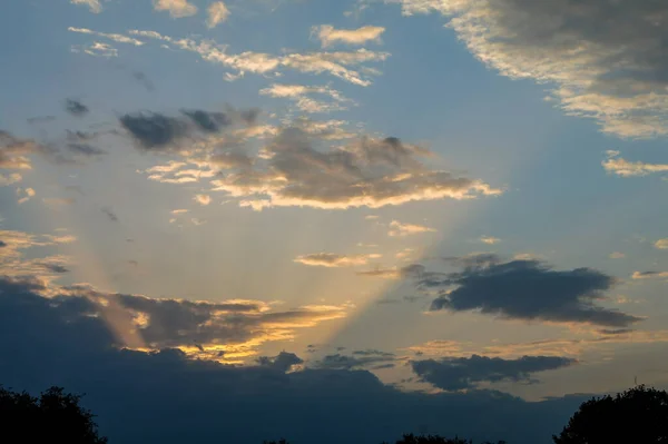 white clouds on sunset sky