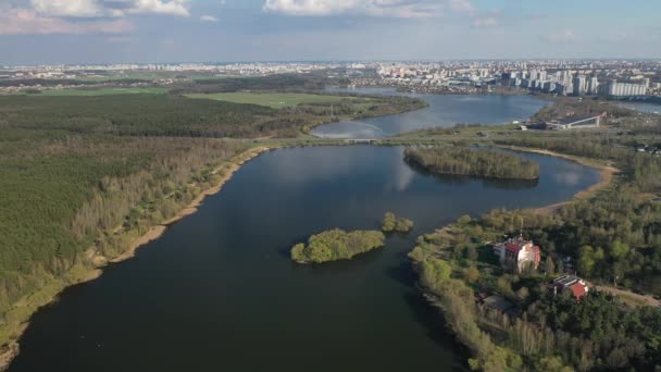 Flying over a river and forest near the city of Minsk.The reservoir space invaders.Belarus.Europe. — Stock Video