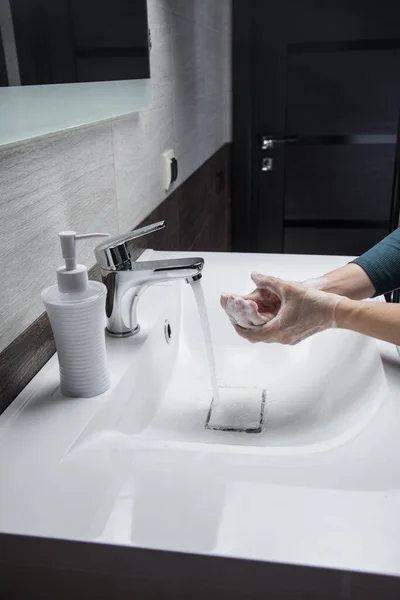 Washing hands with soap for corona virus prevention, hygiene to stop spreading coronavirus.