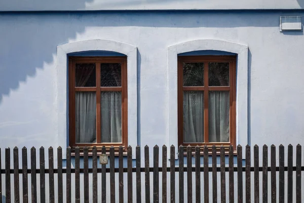Windows of a traditional log cabin in Zilina region, Cicmany Slovakia.