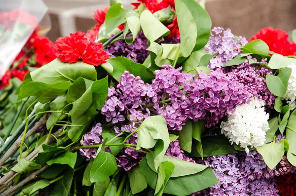 Flowers of Victory. Photo of fresh flowers near the eternal flame on Victory Day.