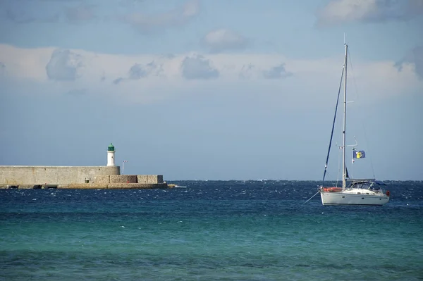Sailboat Bright Blue Sea Lighthouse Corsica — Stock Photo, Image