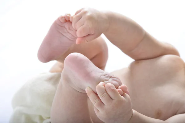 Baby arms hand, legs and foot — Stock Photo, Image