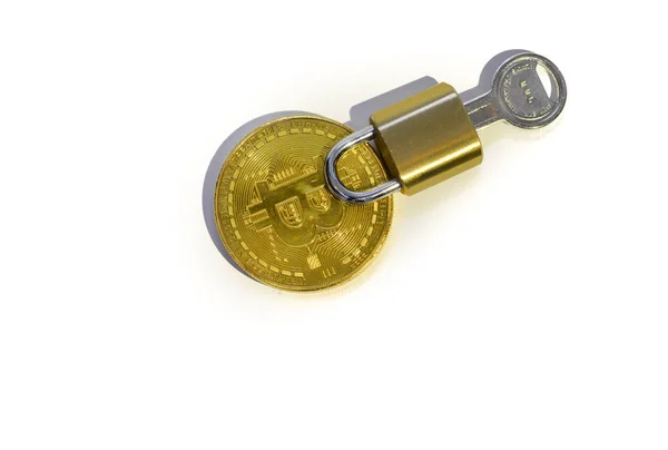 Ключ для криптовалютной монеты биткойна — стоковое фото