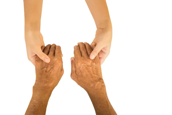 Jeune femme main tenant les mains âgées isolées — Photo