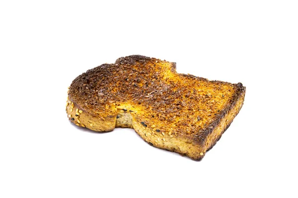 Burned slice of toast isloated on white background. — Stock Photo, Image