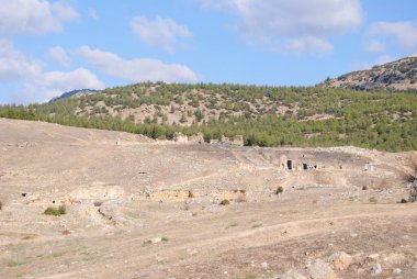 pamukkale, turkey: ruins of the city of hierapolis of the dead amphitheater.