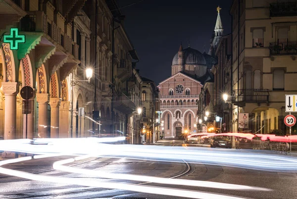 Light trails, fast internet connection concept. Basilica of Saint Anthony of Padua view from Piazza della Valle in Padua, Veneto, Italy.