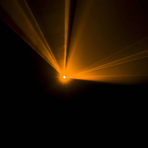 オレンジ色のレーザービーム — ストック写真