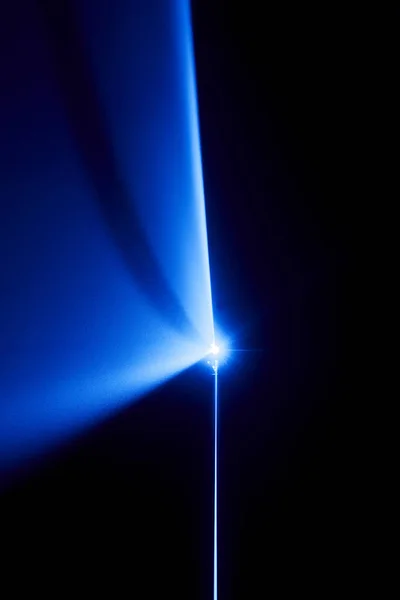 Laser beam blue on a black background