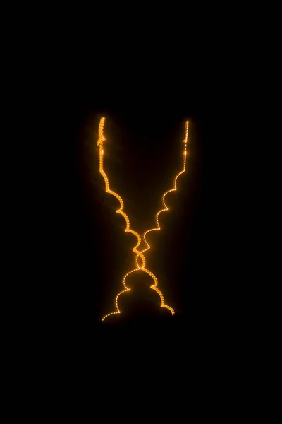 Лазерний промінь помаранчевий на чорному фоні — стокове фото