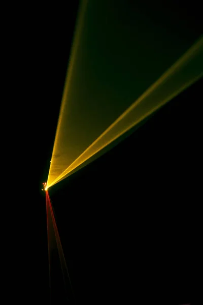 Promień lasera przechylić orange na czarnym tle — Zdjęcie stockowe