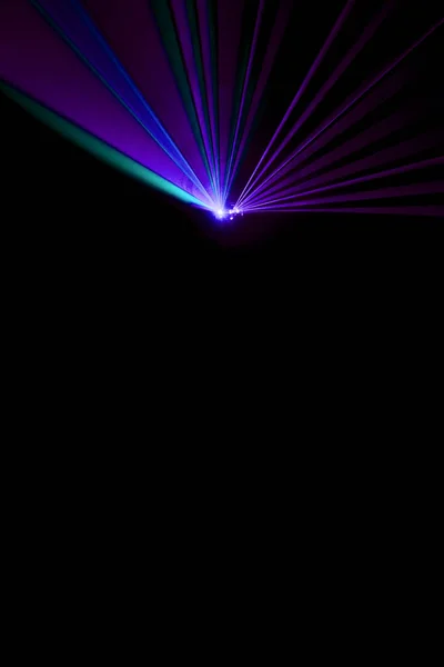 Laser beam purple on a black background