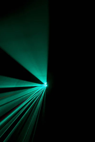 Laser beam  light blue on a black background — Stock Photo, Image