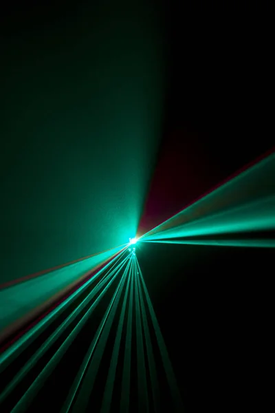Laser beam  light blue on a black background
