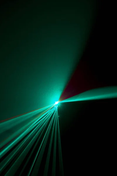 Laser beam  light blue on a black background