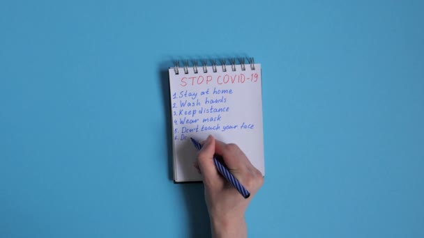 Stop Covid Measures Written Hand Woman Notebook Stay Home Wash — Stock Video