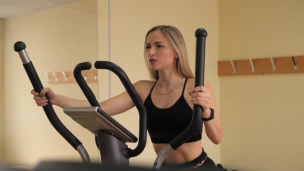 Attractive Woman Working Out Sports Simulator Gym — Stock Video