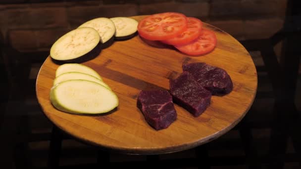Raw Beef Eggplant Zucchini Tomatoes Wooden Table Ingredients Spin Stand — Stock Video