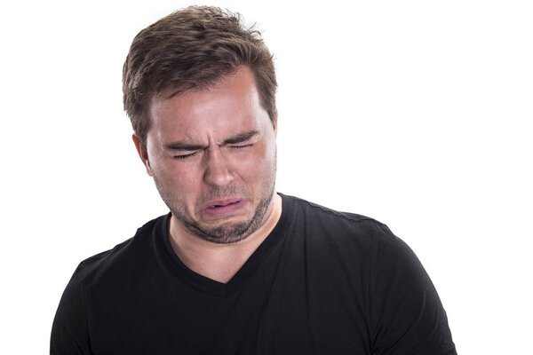Man on White Background Looking Disgusted