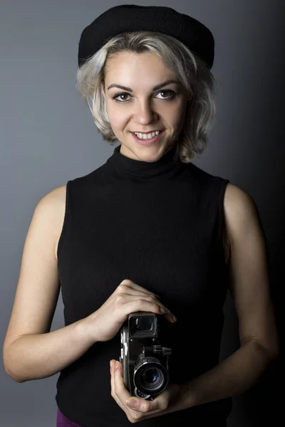 Female Filmmaker Holding a Vintage Video Camera — Stock Photo, Image